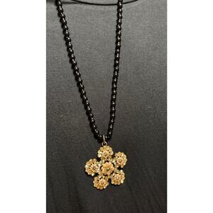 Y58  Gold Colored Flower on long black bead necklace